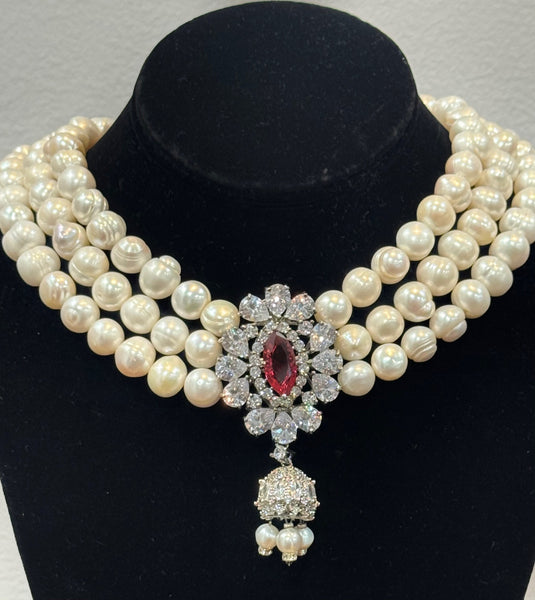 Anya , Fresh water Pearls Necklace with red CZ and clear stone center piece