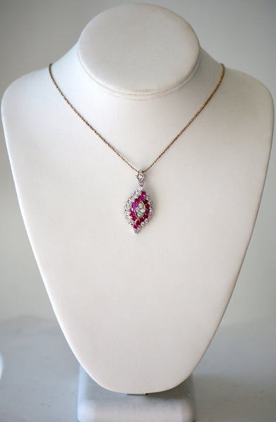 Gold chain with pink and crystal pendant