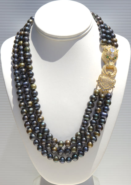 Theodora - Heftsi Black Fresh water pearls 3 row necklace with gold plated side clasp